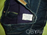 Отличная новая джинсовая юбка ,но этикетка срезана.Юбка синего цвета с осветленн. . фото 4