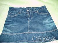 Отличная новая джинсовая юбка ,но этикетка срезана.Юбка синего цвета с осветленн. . фото 2