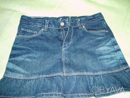Отличная новая джинсовая юбка ,но этикетка срезана.Юбка синего цвета с осветленн. . фото 1