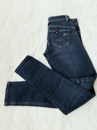 Женские джинсы темно- синего цвета в хорошем состоянии.. . фото 2