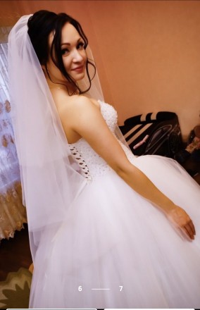 Продам красивое свадебное платье.
Размер регулируется за счёт завязок.
На рост. . фото 7