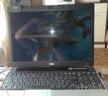 Продам старый,но рабочий ноутбук.Работает от сети есть мыша,видеокамера.. . фото 1