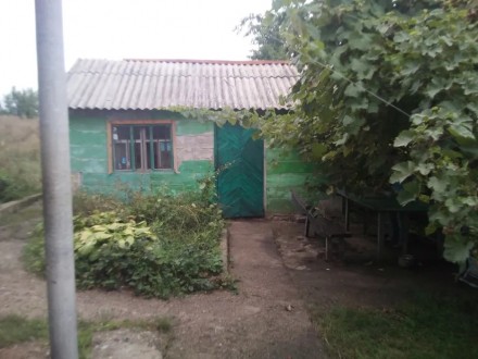 Дом в хорошем состоянии, деревяный оюложеный кирпичем, газ, канализация, вода в . Купянск. фото 4