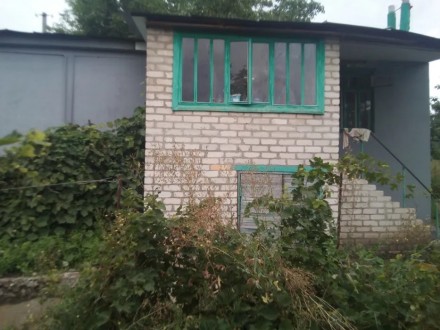 Дом в хорошем состоянии, деревяный оюложеный кирпичем, газ, канализация, вода в . Купянск. фото 2