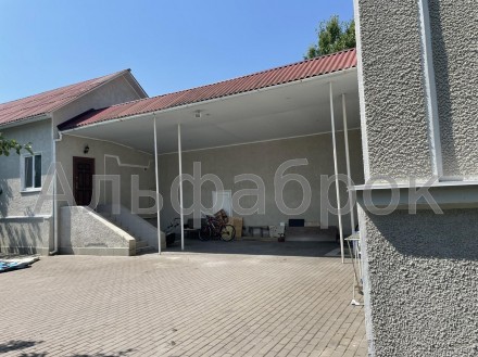 Дом в с.Таценки в Обуховском районе просторный участок: на нем расположены два д. . фото 3