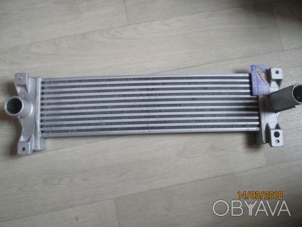 Радиатор интеркулера - промежуточный охладитель воздуха для автомобилей Саненг А. . фото 1
