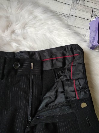 Школьные брюки Rado на мальчика черные в полоску
в идеальном состоянии
Размер . . фото 4