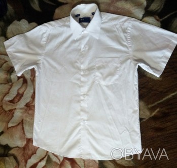 Белая рубашка Турция короткий рукав 135-150см на мальчика 
34 размер
Очень хор. . фото 1