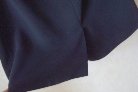 Стильная женская короткая юбка черного цвета, на подкладке, будет идеальным вари. . фото 6