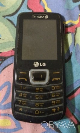 Продам мобильный телефон LG A290 на 3 сим-карты. Поставила на зарядку
а утром п. . фото 1