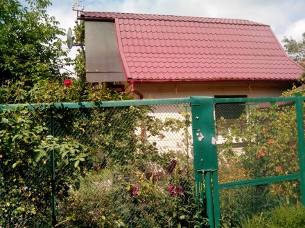Кирпичный дом под металлочерепицей с мансардой, природный газ, отопление газовым. Круглик. фото 2