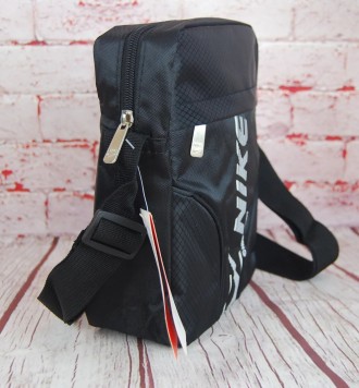 Спортивная сумка-барсетка через плечо Nike .Тканевая сумка. КС15

Сумка имеет . . фото 6