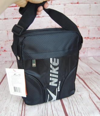 Спортивная сумка-барсетка через плечо Nike .Тканевая сумка. КС15

Сумка имеет . . фото 7