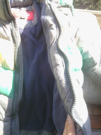 Зимняя курточка Kikq. Синтепоновая, внутри флис. Толстая и теплая. Длина от плеч. . фото 3