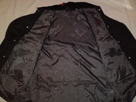 Продам новую стеганную демикуртку (легкая) черного цвета для мужчин известной фи. . фото 8