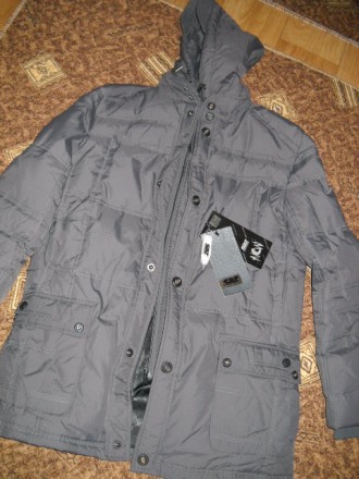 Зимняя курточка,фирмы SAZ.Новая.Водоотталкивающая ткань.Размер 48.Тёплая и лёгка. . фото 2