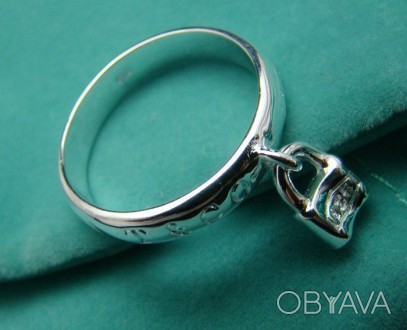 
Кольцо с ЗАМКОМ - Покрытие серебром 925
Размер кольца 17,5 мм
Ширина кольца 4,5. . фото 1