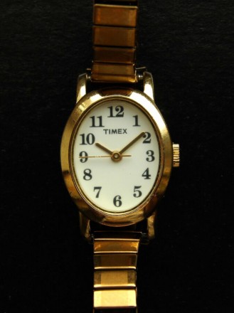 TIMEX изящные овальные часы из США в золотом тоне. Запорожье. фото 1 TIMEX изящные овальные часы из США в золотом тоне. Запорожье. фото 1