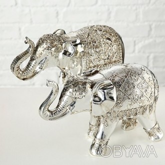 Элегантная статуэтка серебряного слона. Фигурка в старинном стиле с хоботом наве. . фото 1