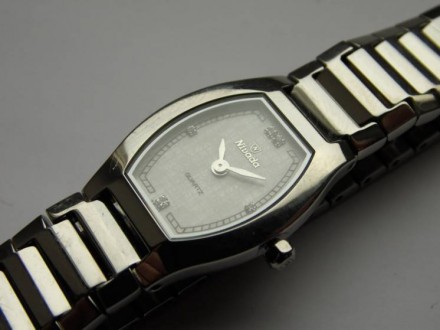 
Швейцарские часы б/у в идеальном состоянии, часы полностью из нержавеющей стали. . фото 5