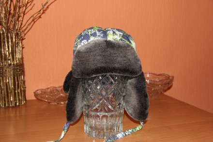 Зимняя шапка для мальчиков с мехом
Бренд: ASSA
Удобная застежка
Тёплая флисов. . фото 3