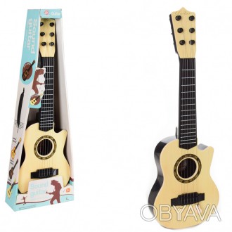 Гитара, выполненная в традиционном стиле, - оригинально оформленный музыкальный . . фото 1