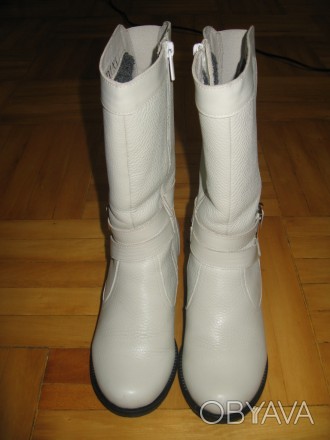 Продам новые кожанные сапоги