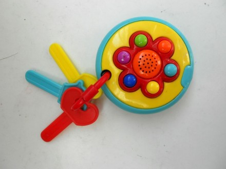 Яркие детские пластиковые музыкальные ключи 6 кнопок 
Работают от 2 батареек АА. . фото 2