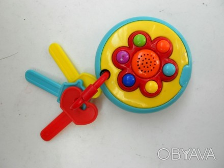 Яркие детские пластиковые музыкальные ключи 6 кнопок 
Работают от 2 батареек АА. . фото 1