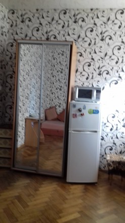 Сдам комнату в коммуне на Ольгиевской. Мебель, балкон, есть своя стиральная маши. Приморский. фото 4