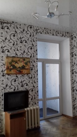 Сдам комнату в коммуне на Ольгиевской. Мебель, балкон, есть своя стиральная маши. Приморский. фото 3