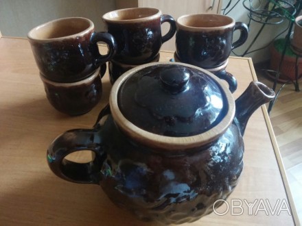 Сервиз:
Большой заварочный чайник и 6 чашек.Керамика,покрытая лаком.
Абсолютно. . фото 1