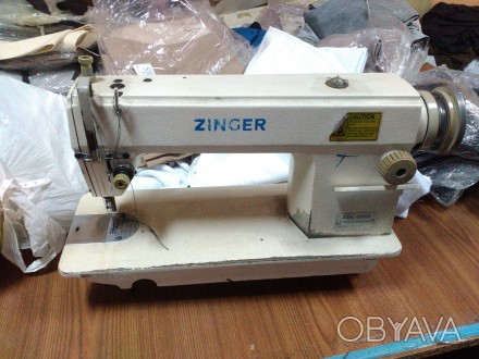 Промышленная швейная машинка Zinger, б/у.

Имеет 3-х фазный двигатель 380 воль. . фото 1