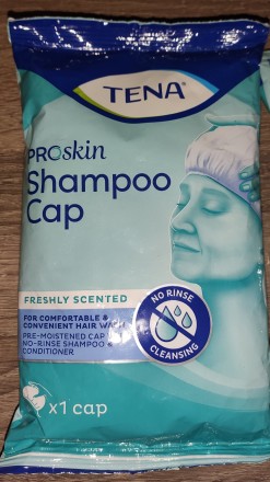 Шапочка для мытья головы без воды Tena Shampoo Cap экспресс-шампунь .

Упаковк. . фото 2