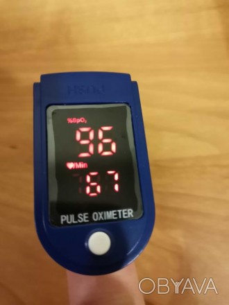 пульсоксиметр служит для измерения уровня кислорода в крови, а также для измерен. . фото 1