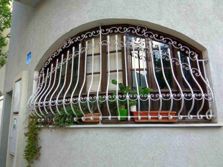изготовление металлоконструкций:
решёток и ставен на окна,
металлических двере. . фото 2
