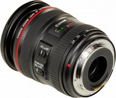 Продам объектив Canon EF 24-105mm f/4.0L IS USM.

Состояние идеальное.

В ко. . фото 6