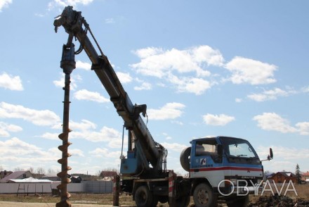 Услуги ямобура (бурокрана) Mitsubishi Canter
