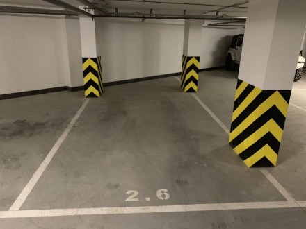 Продам 2 паркоместа в подземном паркинг в Центре - район 100-й лицей, в новом ст. . фото 2