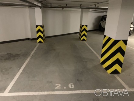 Продам 2 паркоместа в подземном паркинг в Центре - район 100-й лицей, в новом ст. . фото 1