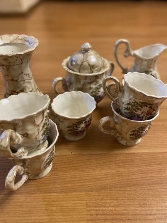 Чайный сервиз с керамики , в комплекте : 1 вазочка , 6 чашек, сахарница, для мол. . фото 4