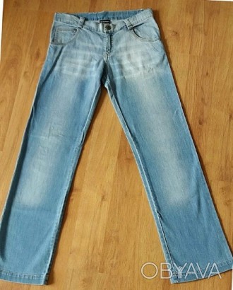 Гранжированные (потёртые) джинсы от одного из самых успешных модных домов в мире. . фото 1