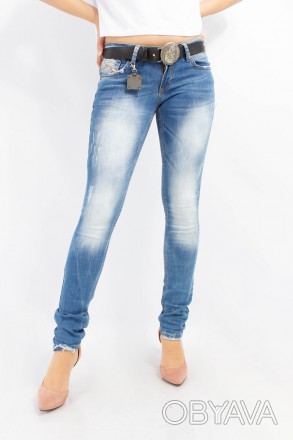 
Женские зауженные джинсы синего цвета
Классические женские джинсы, производство. . фото 1