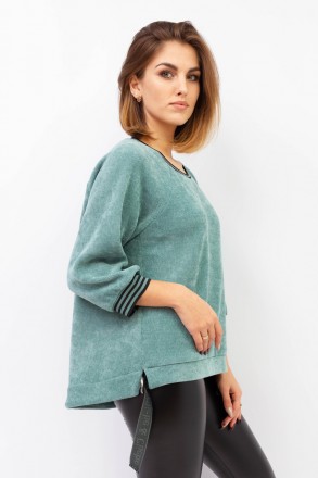 
Женский свитер Cliche
Классический свитер бирюзового цвета с черными элементами. . фото 3