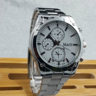 
Мужские наручные часы V8 в стиле Armani
 Характеристики:
Материал корпуса - мет. . фото 3