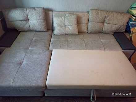 Очень функциональный, стильный, качественный угловой диван с пуфом в отличном ра. . фото 5