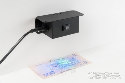 Компактный и удобный в использовании светодиодный детектор банкнот, имеющий ульт. . фото 1