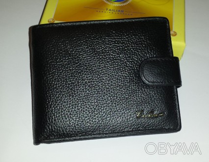 
Фирменный мужской кошелёк из натуральной кожи Tailian. Идёт в своей фирменной ф. . фото 1