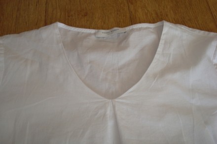 Красивая блузка белая мысик ткань слегка сжатка с коротким рукавом, по низу крас. . фото 7