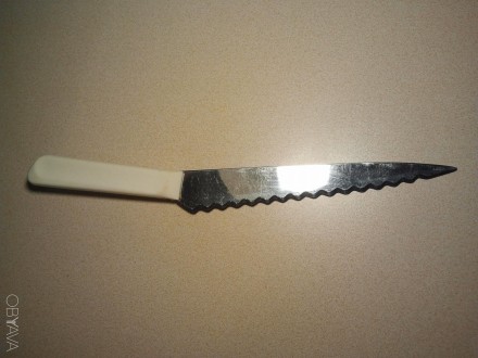 Кухонный нож из высококачественной нержавеющей стали.
Есть надпись. Изготовлен . . фото 3
